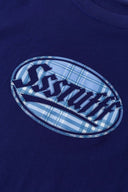 Navy t-shirt with check patchwork and puff-printed details that mimic stitching