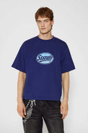 Navy t-shirt with check patchwork and puff-printed details that mimic stitching