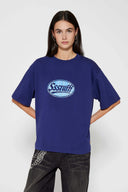 Navy t-shirt with check patchwork and puff-printed details that mimic stitching