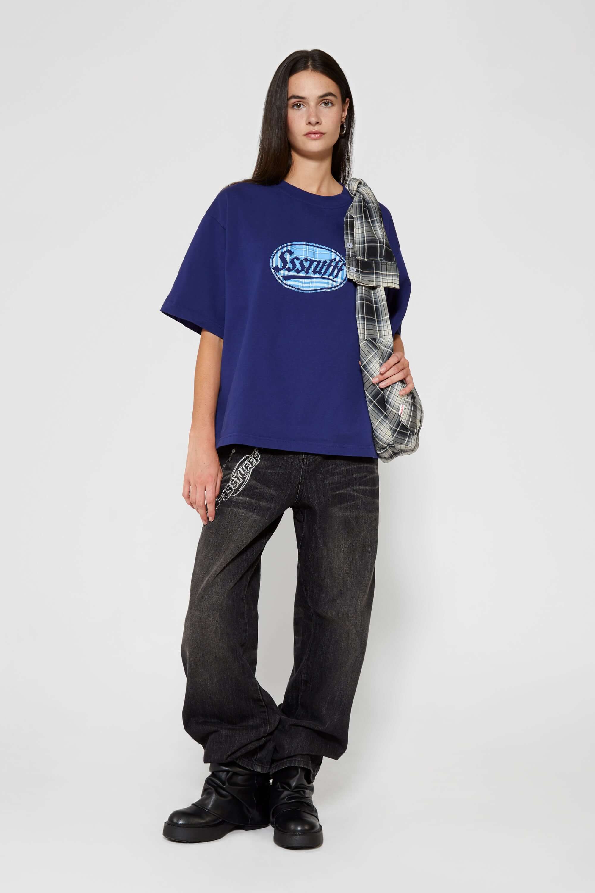 Navy t-shirt with check patchwork and puff-printed details that mimic stitching