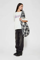 White t-shirt with check patchwork and puff-printed details that mimic stitching