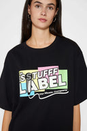 Black t-shirt with microphone graphic featuring mesh fabric detail on microphone top