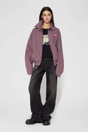 Black t-shirt with microphone graphic featuring mesh fabric detail on microphone top