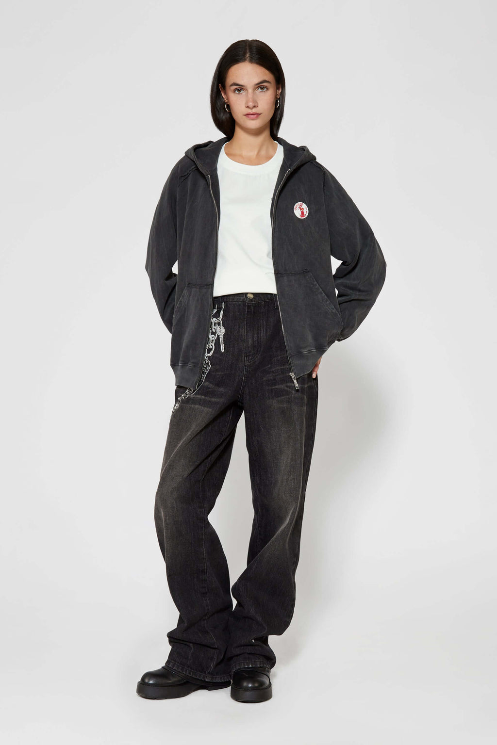 Vintage black zip-up hoodie with LED-lit TPU cat logo on chest and hand-sewn missing cat patches on back