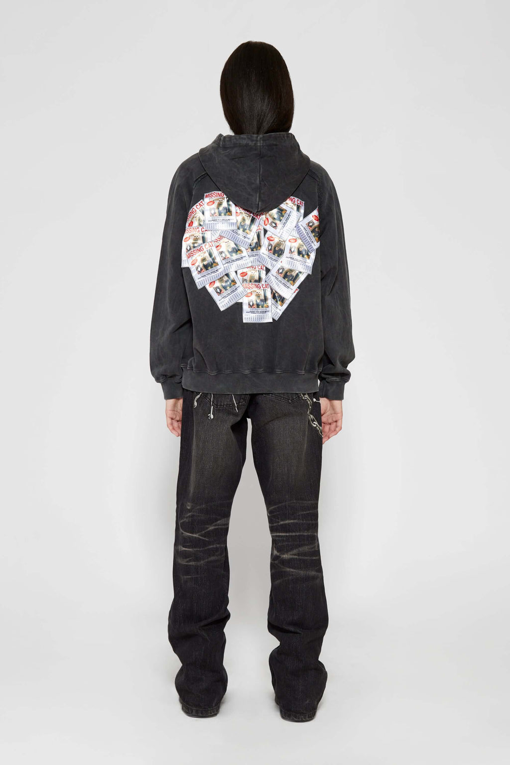 Vintage black zip-up hoodie with LED-lit TPU cat logo on chest and hand-sewn missing cat patches on back