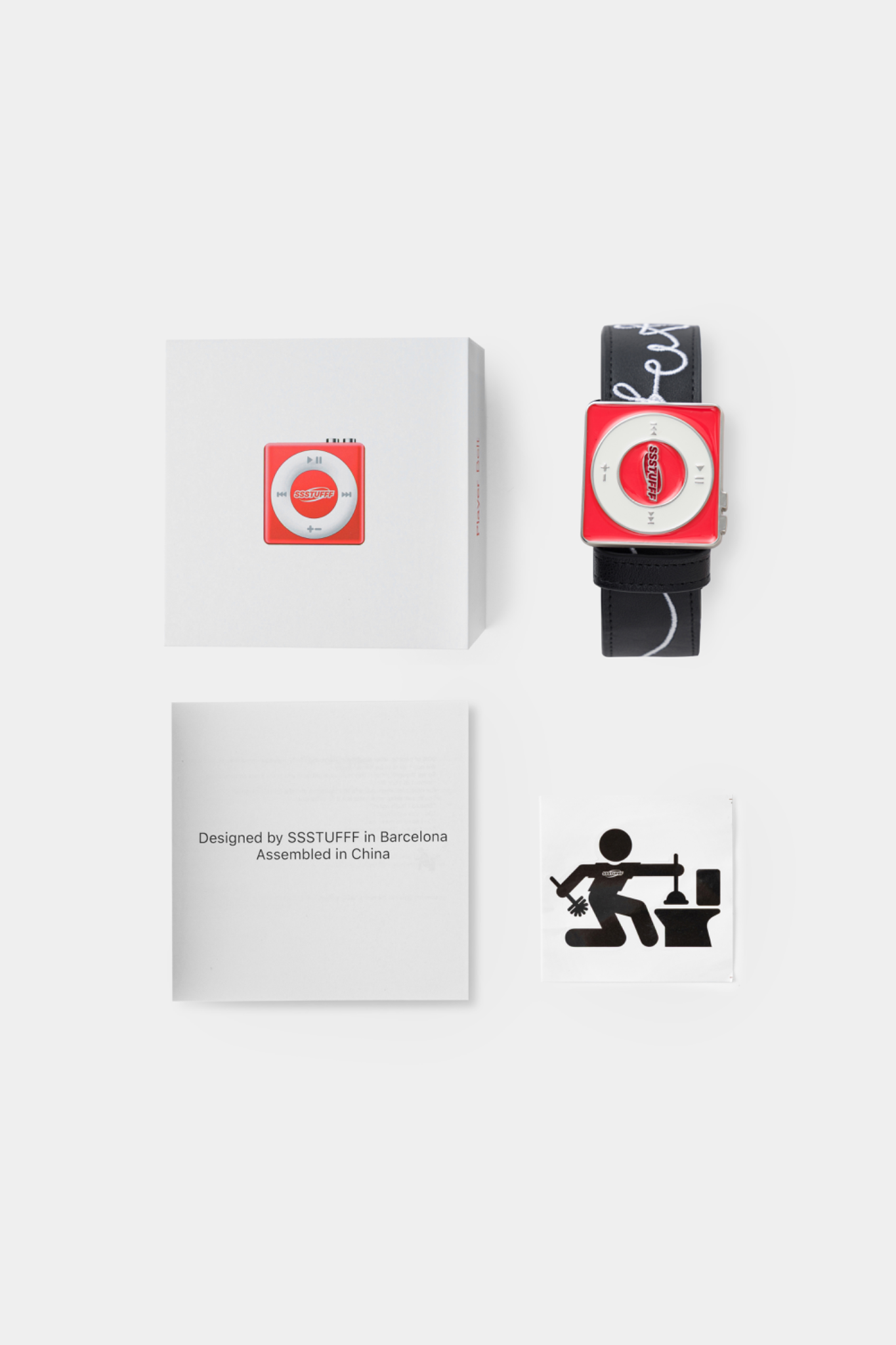 Black leather belt featuring a red and white square buckle designed to resemble a classic iPod Shuffle music player.