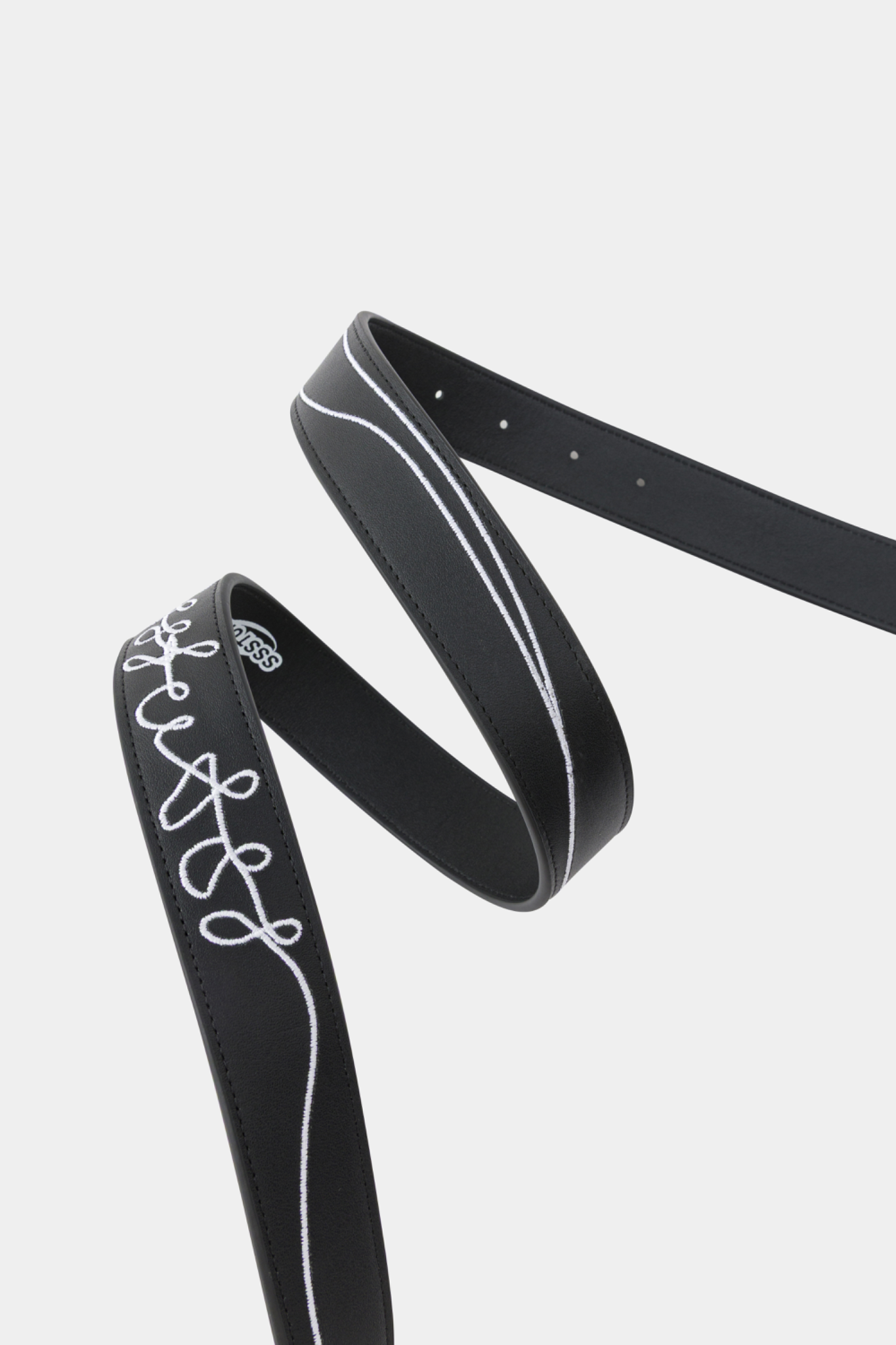 Black leather belt featuring a red and white square buckle designed to resemble a classic iPod Shuffle music player.