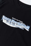 Black t-shirt with piano key graphic featuring raised puff print on white keys and SSSTUFFF Rhythm text