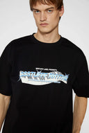 Black t-shirt with piano key graphic featuring raised puff print on white keys and SSSTUFFF Rhythm text