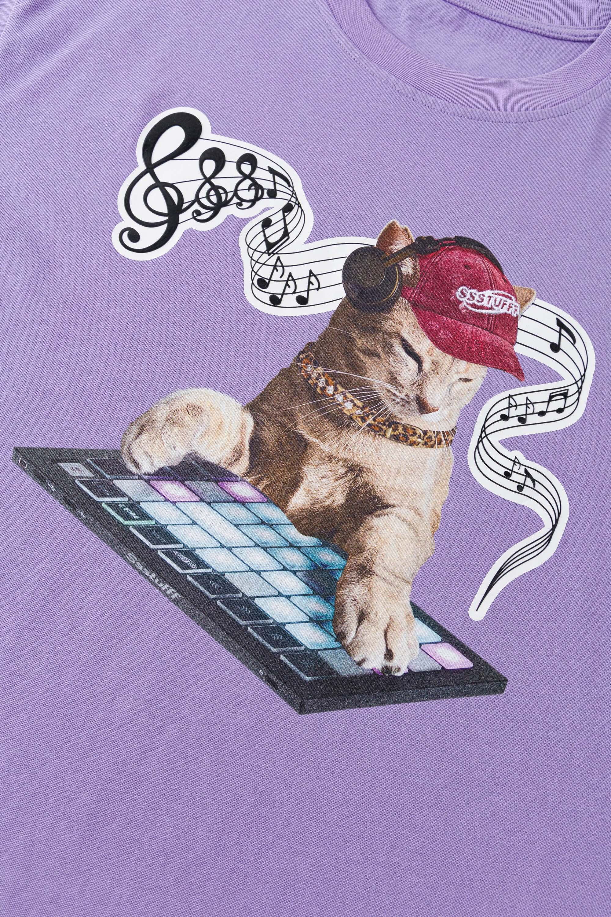 Purple t-shirt with embroidered SSSTUFFF logo and silicone-printed musical notes