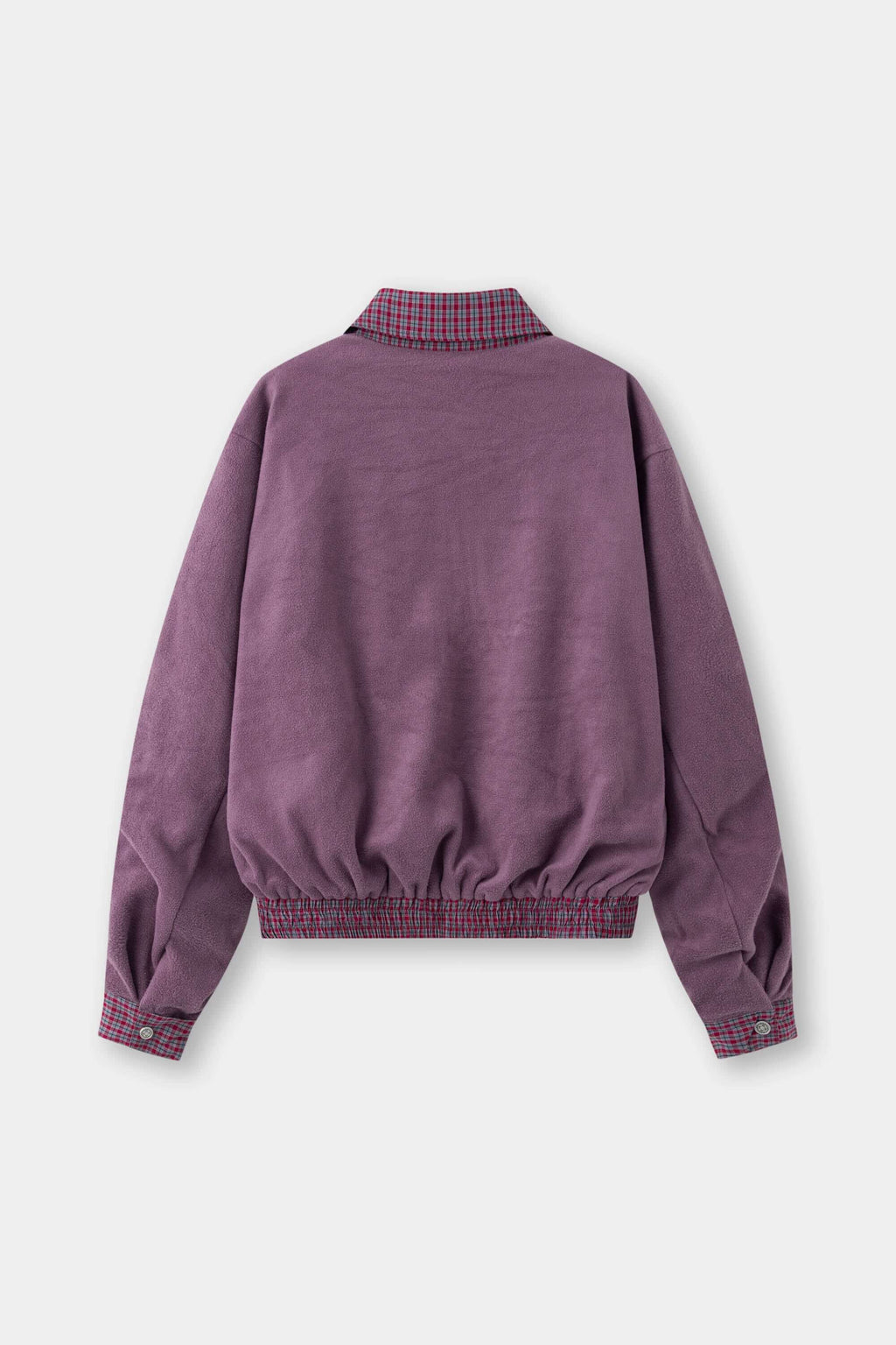 Reversible jacket with burgundy and grey micro-check pattern on one side and purple fleece on reverse