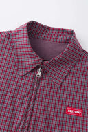 Reversible jacket with burgundy and grey micro-check pattern on one side and purple fleece on reverse