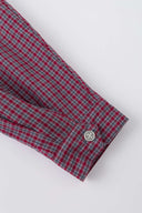 Reversible jacket with burgundy and grey micro-check pattern on one side and purple fleece on reverse