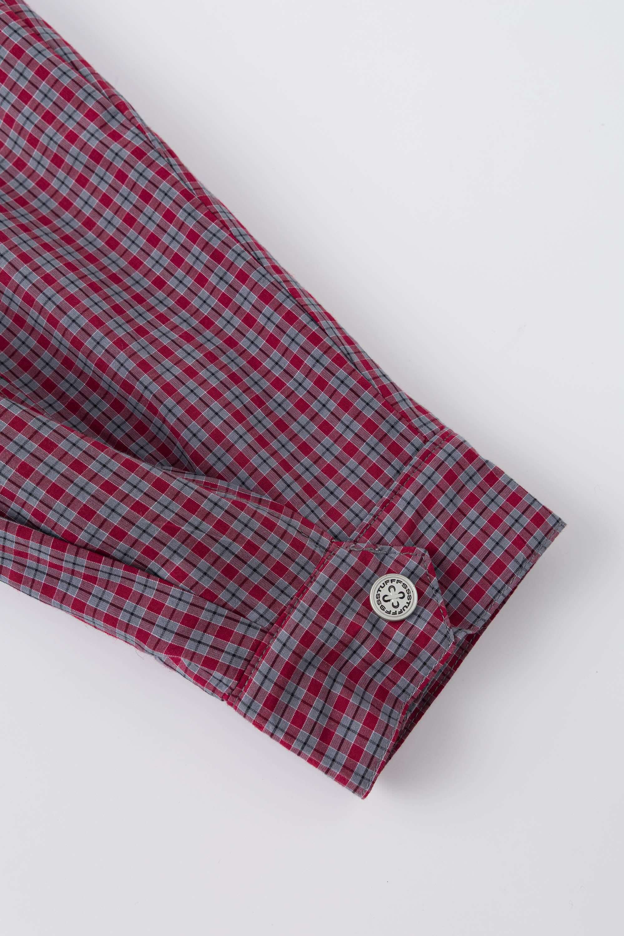 Reversible jacket with burgundy and grey micro-check pattern on one side and purple fleece on reverse