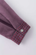 Reversible jacket with burgundy and grey micro-check pattern on one side and purple fleece on reverse