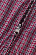 Reversible jacket with burgundy and grey micro-check pattern on one side and purple fleece on reverse