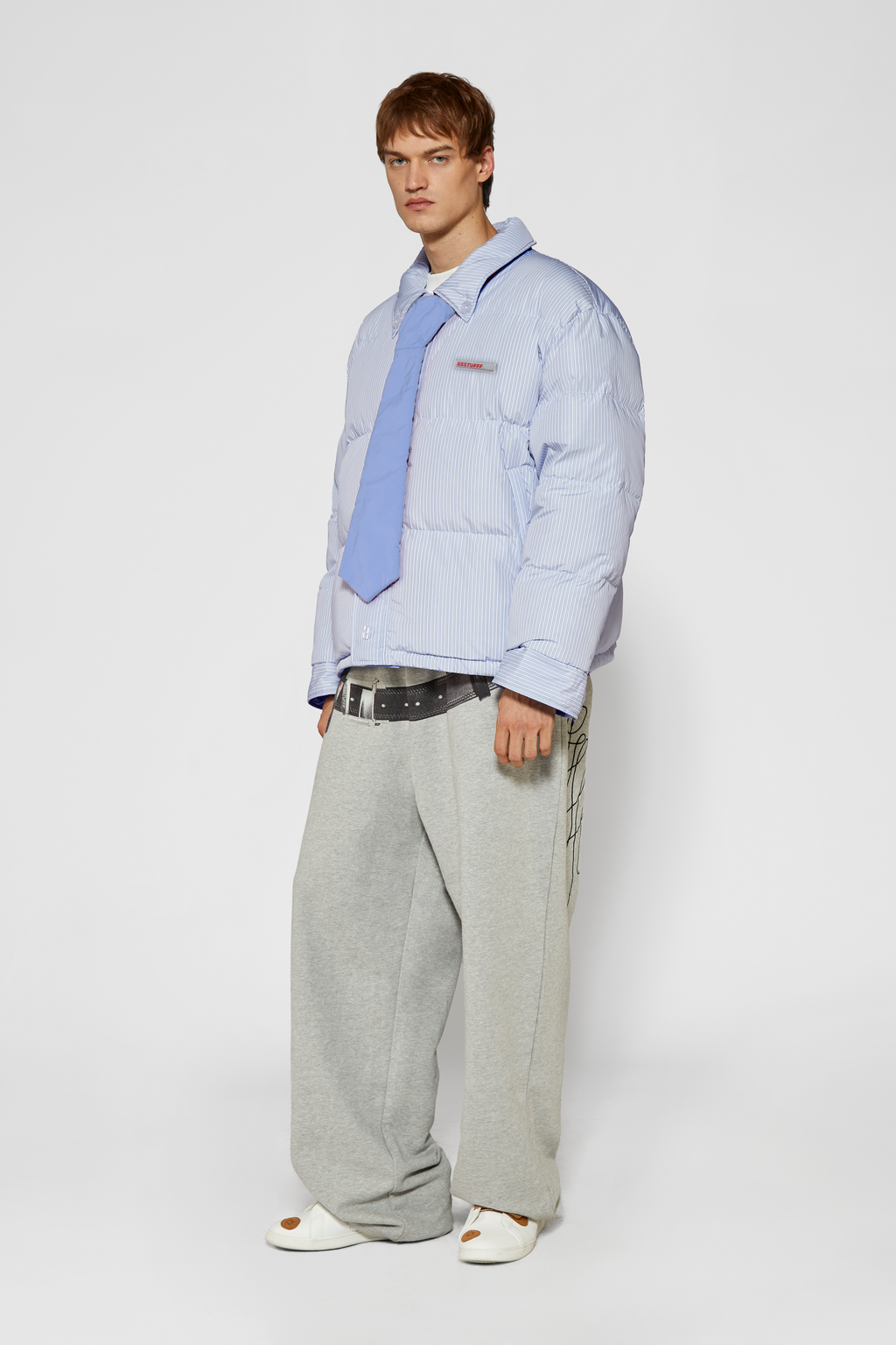 Reversible down puffer jacket with pinstriped shirt side and pastel blue side, includes two detachable ties