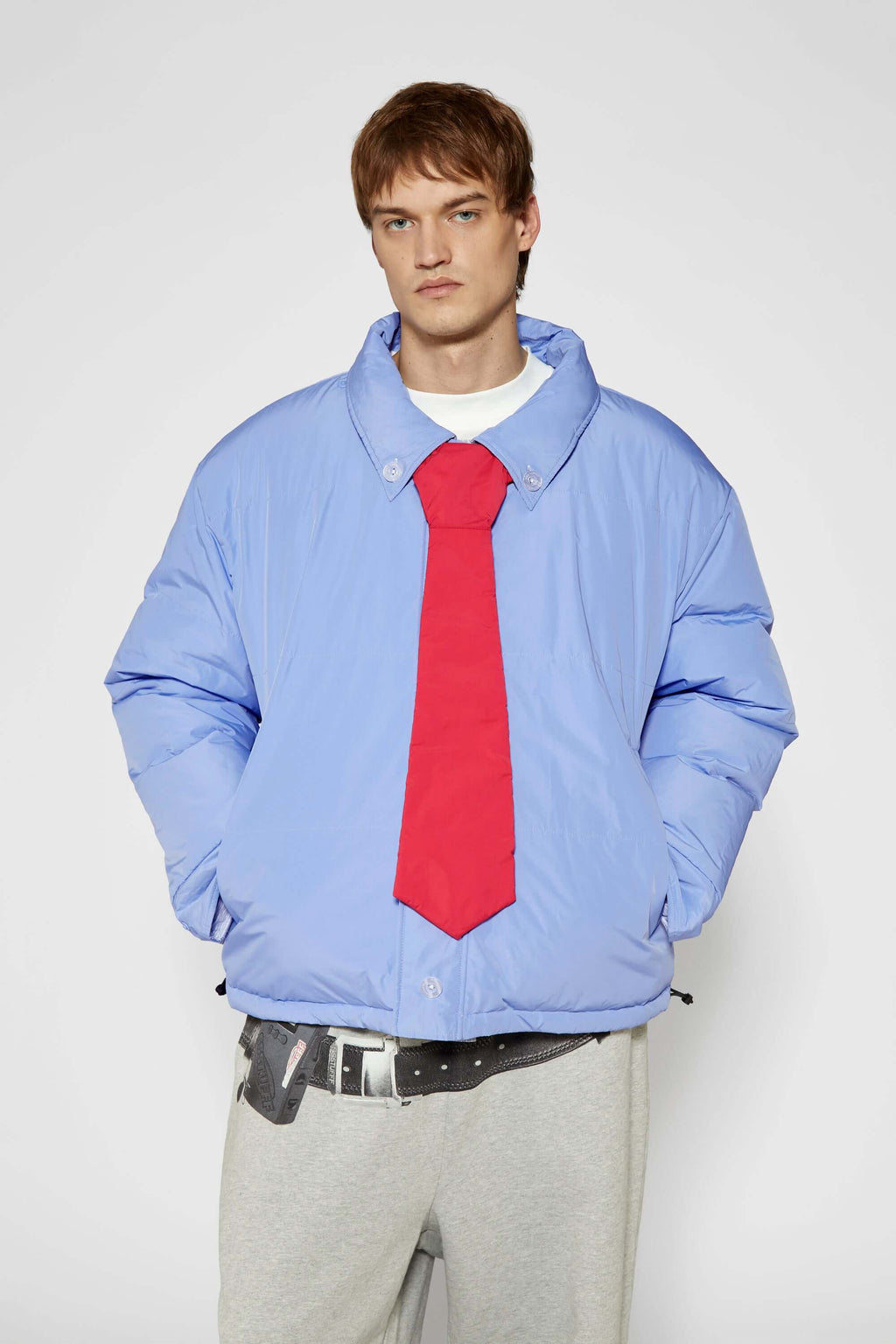 Reversible down puffer jacket with pinstriped shirt side and pastel blue side, includes two detachable ties