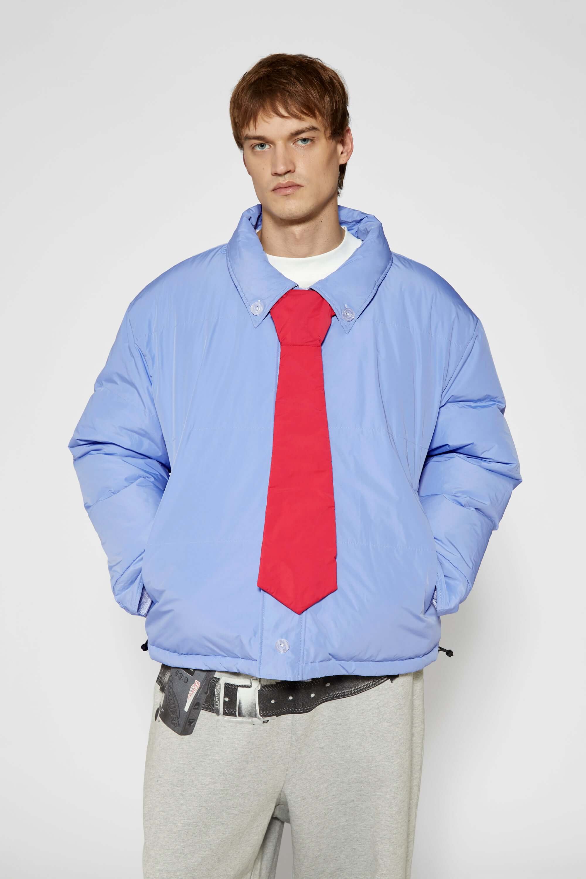 Reversible down puffer jacket with pinstriped shirt side and pastel blue side, includes two detachable ties