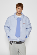 Reversible down puffer jacket with pinstriped shirt side and pastel blue side, includes two detachable ties