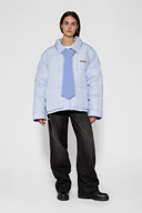 Reversible down puffer jacket with pinstriped shirt side and pastel blue side, includes two detachable ties