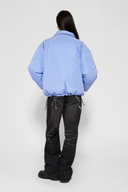 Reversible down puffer jacket with pinstriped shirt side and pastel blue side, includes two detachable ties