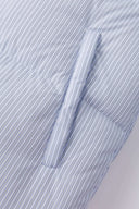 Reversible down puffer jacket with pinstriped shirt side and pastel blue side, includes two detachable ties