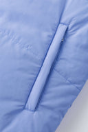 Reversible down puffer jacket with pinstriped shirt side and pastel blue side, includes two detachable ties