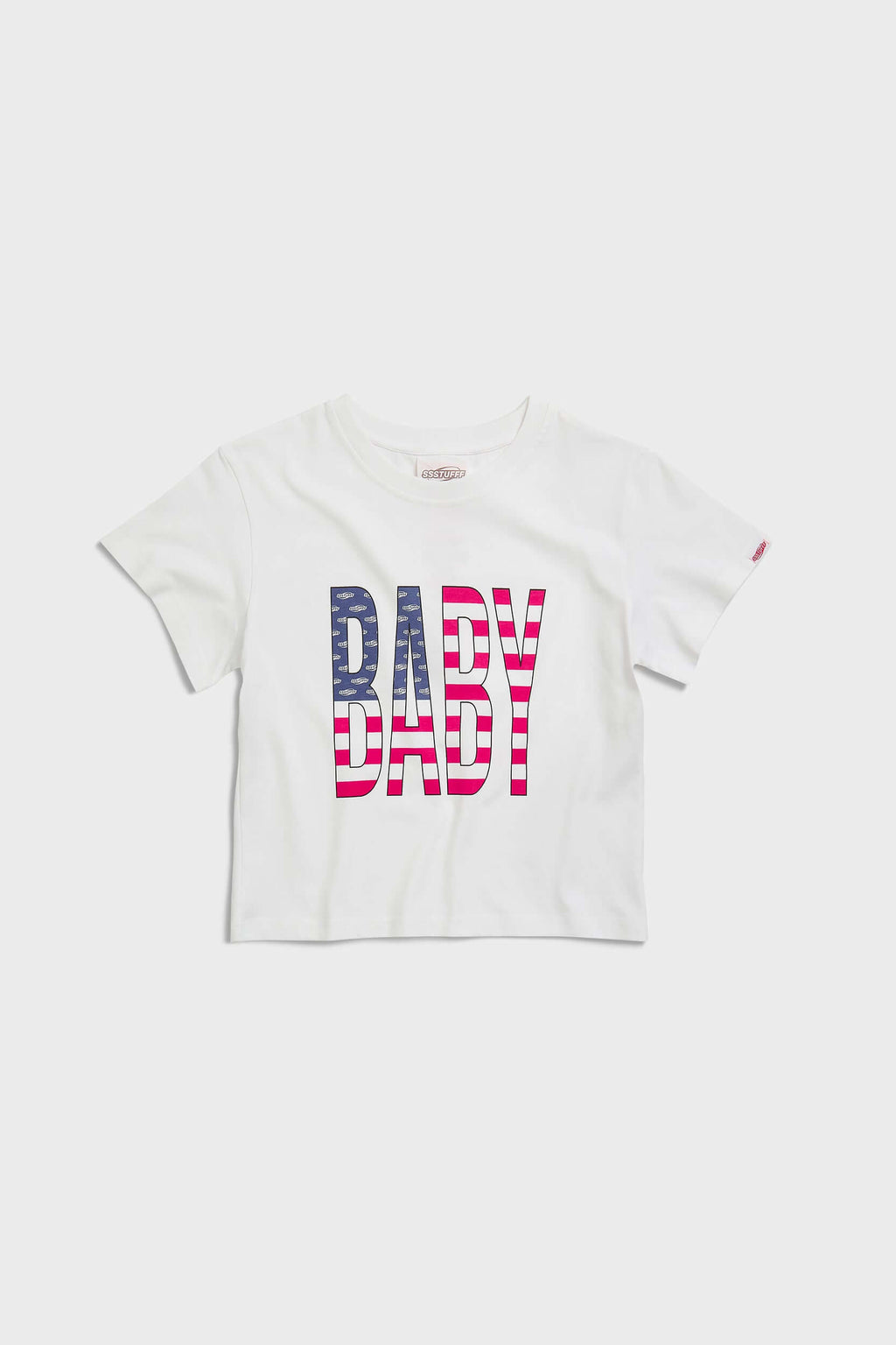 White crew neck t-shirt with the text 'BABY' digitally printed in bold letters with the American flag 