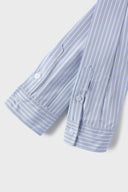 Blue striped croissant-shaped bag with shirt texture and adjustable sleeve handles for shoulder or crossbody wear