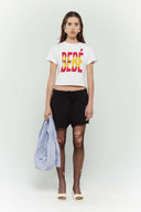 Blue striped croissant-shaped mini bag with shirt texture and adjustable sleeve handles for shoulder or crossbody wear