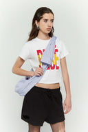 Blue striped croissant-shaped mini bag with shirt texture and adjustable sleeve handles for shoulder or crossbody wear