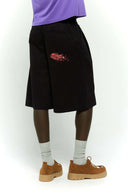 Black cotton shorts with deformed cake digital print and 3D silicone SSSTUFFF logo on the back