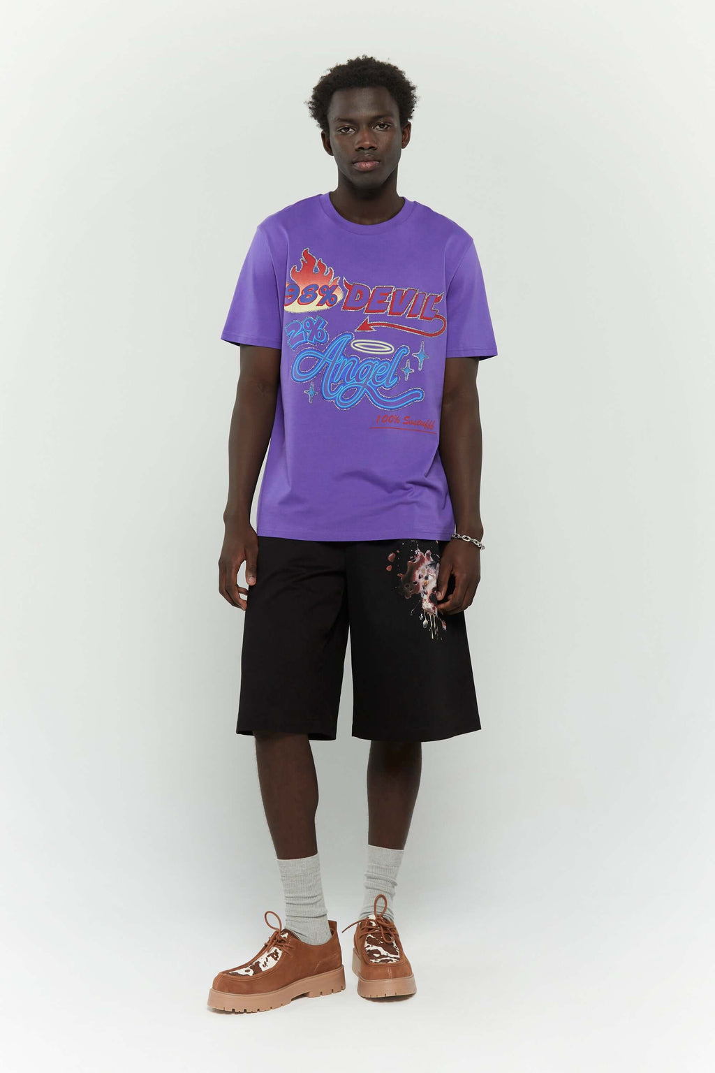 Black cotton shorts with deformed cake digital print and 3D silicone SSSTUFFF logo on the back