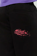 Black cotton shorts with deformed cake digital print and 3D silicone SSSTUFFF logo on the back