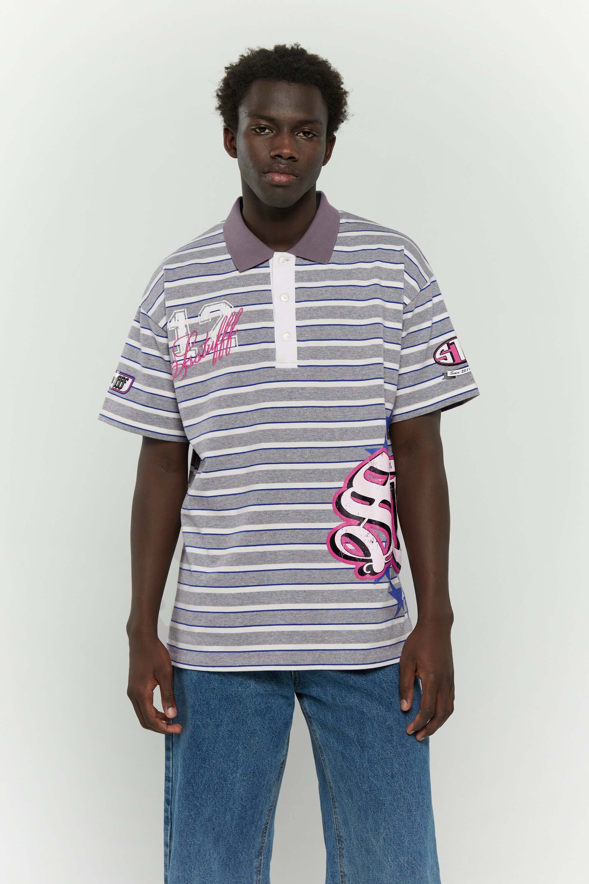 Grey striped polo shirt with embroidery, PVC, and screenprint graphics inspired by retro birthday party style