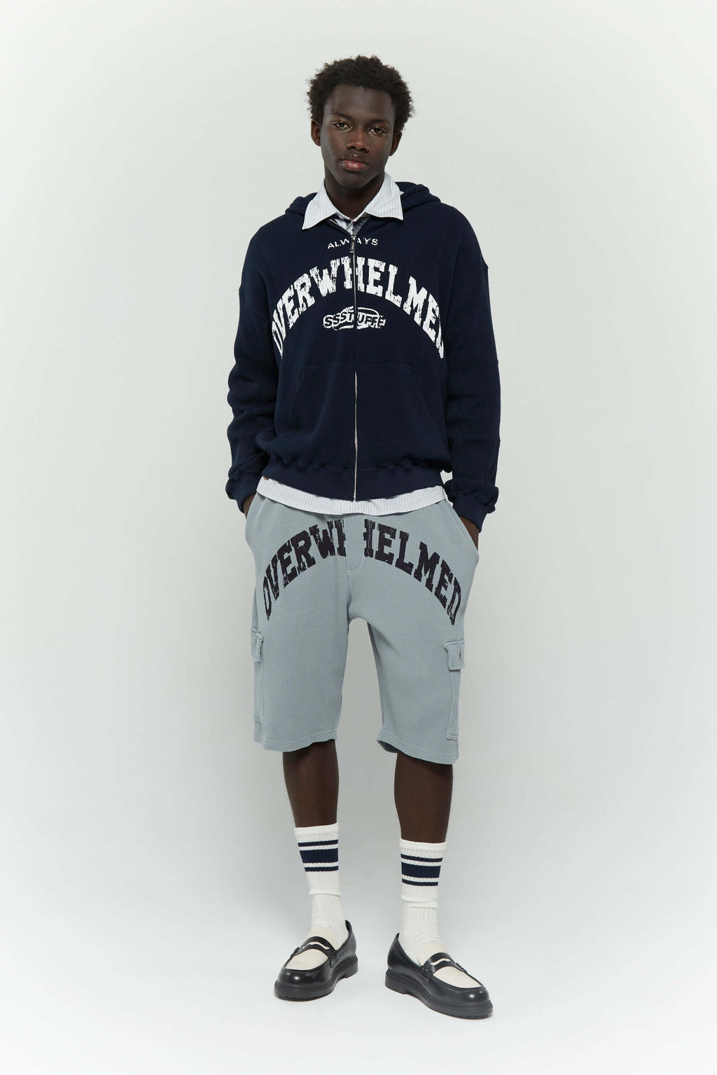 Grey waffle cotton cargo shorts with 'Always Overwhelmed' screenprint and collegiate-style design
