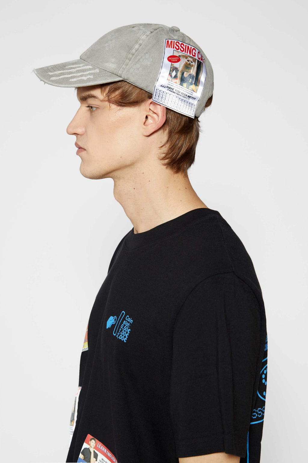 Light grey cotton cap with missing cat jacquard patch and handcrafted cat scratches and footprints