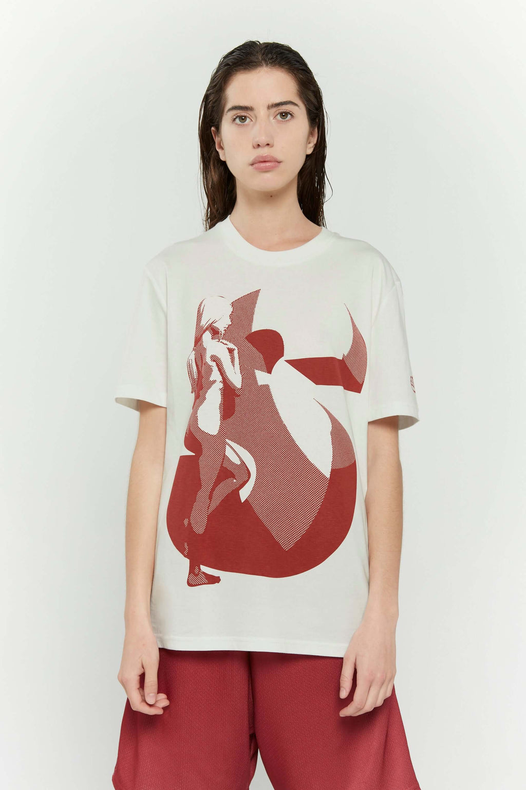 Off white t-shirt with female silhouette looking through large S graphic and SSSTUFFF logo detail on sleeve