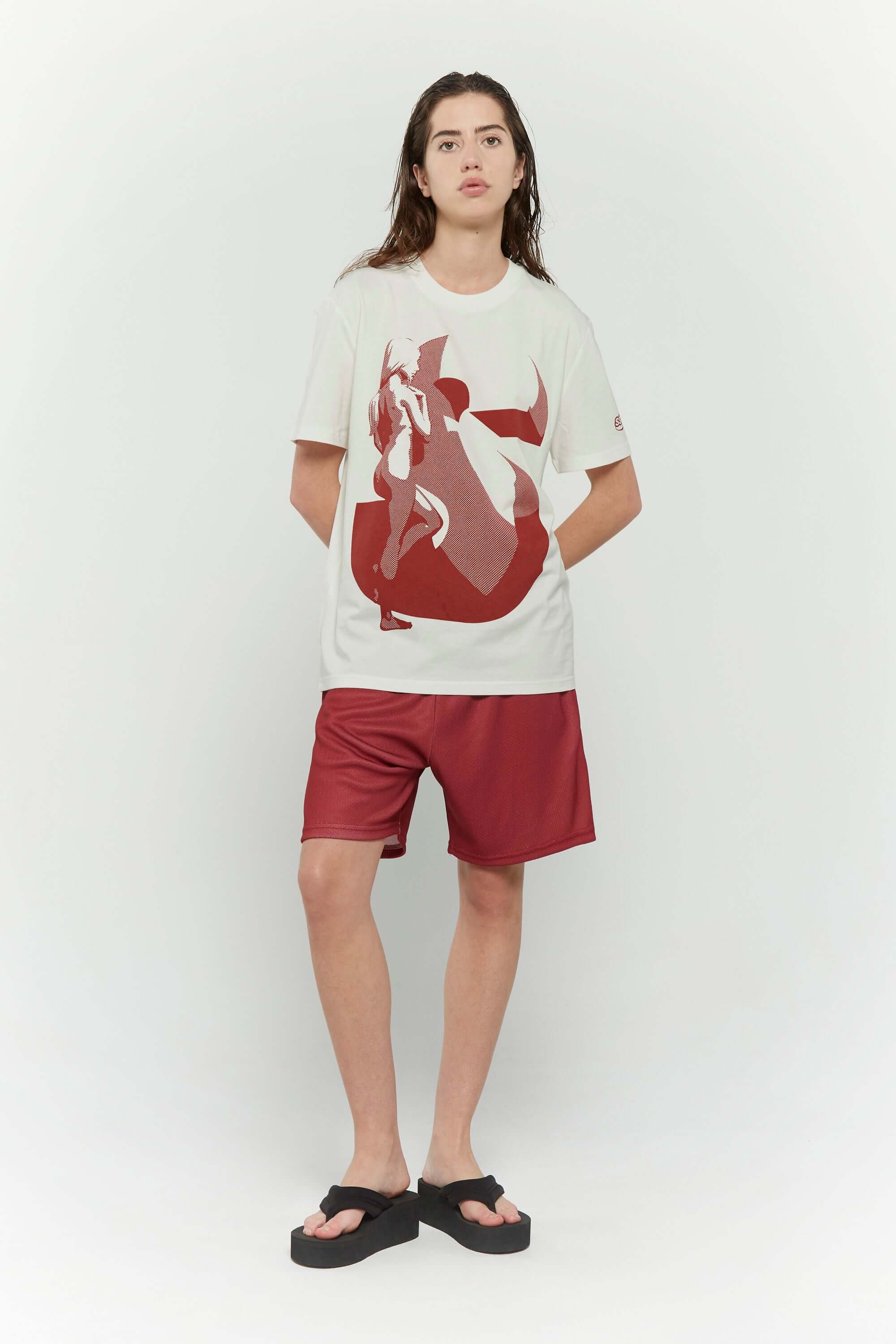Off white t-shirt with female silhouette looking through large S graphic and SSSTUFFF logo detail on sleeve