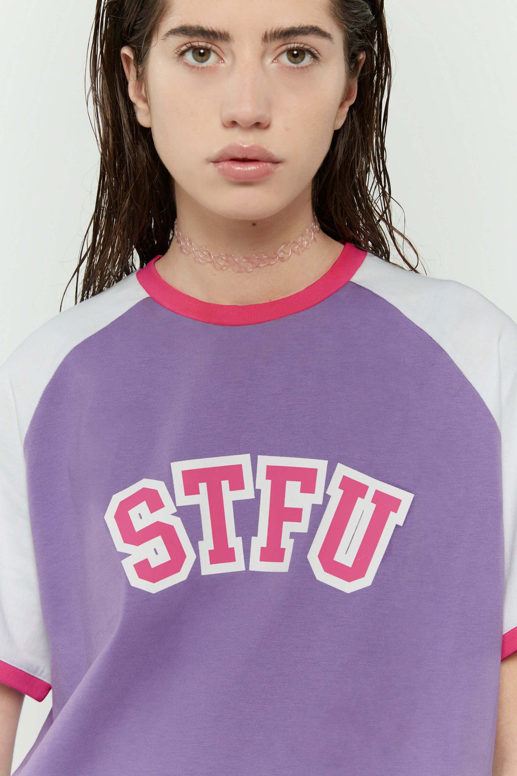 Purple and white crop t-shirt with 'STFU' bold text screenprint