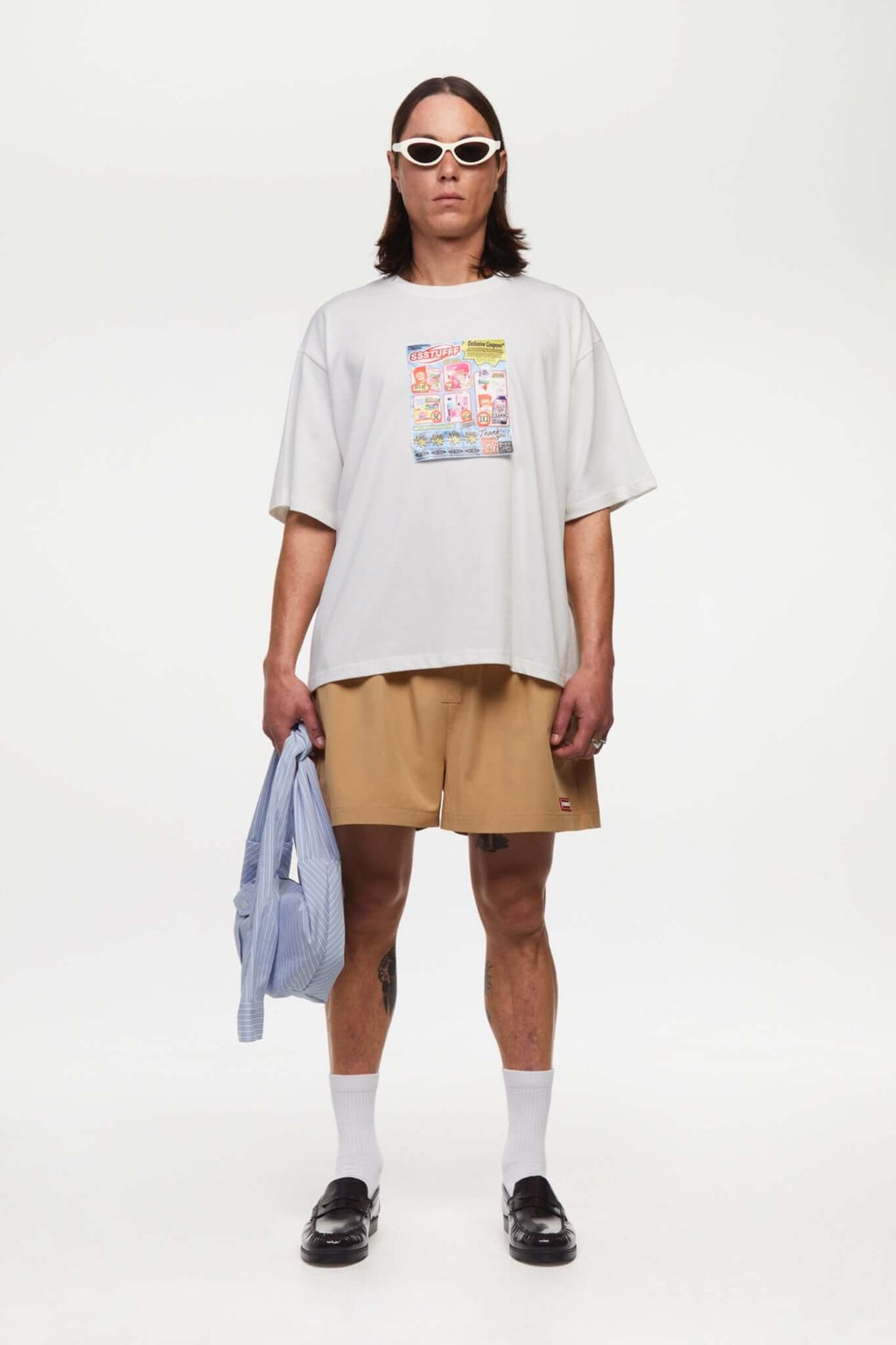 Beige boxer shorts with a red embroidery logo 

