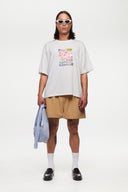 Beige boxer shorts with a red embroidery logo 
