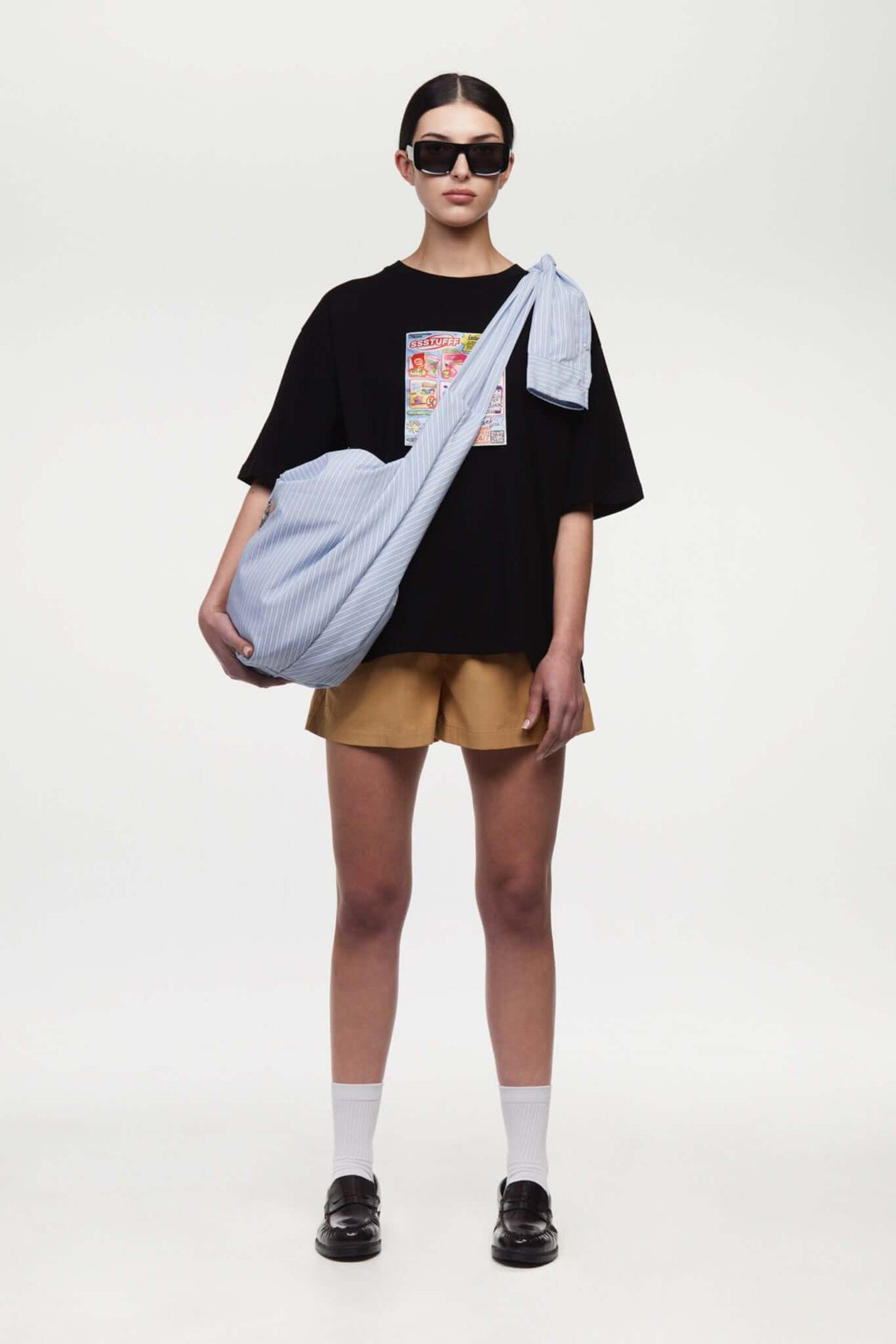 Beige boxer shorts with a red embroidery logo 
