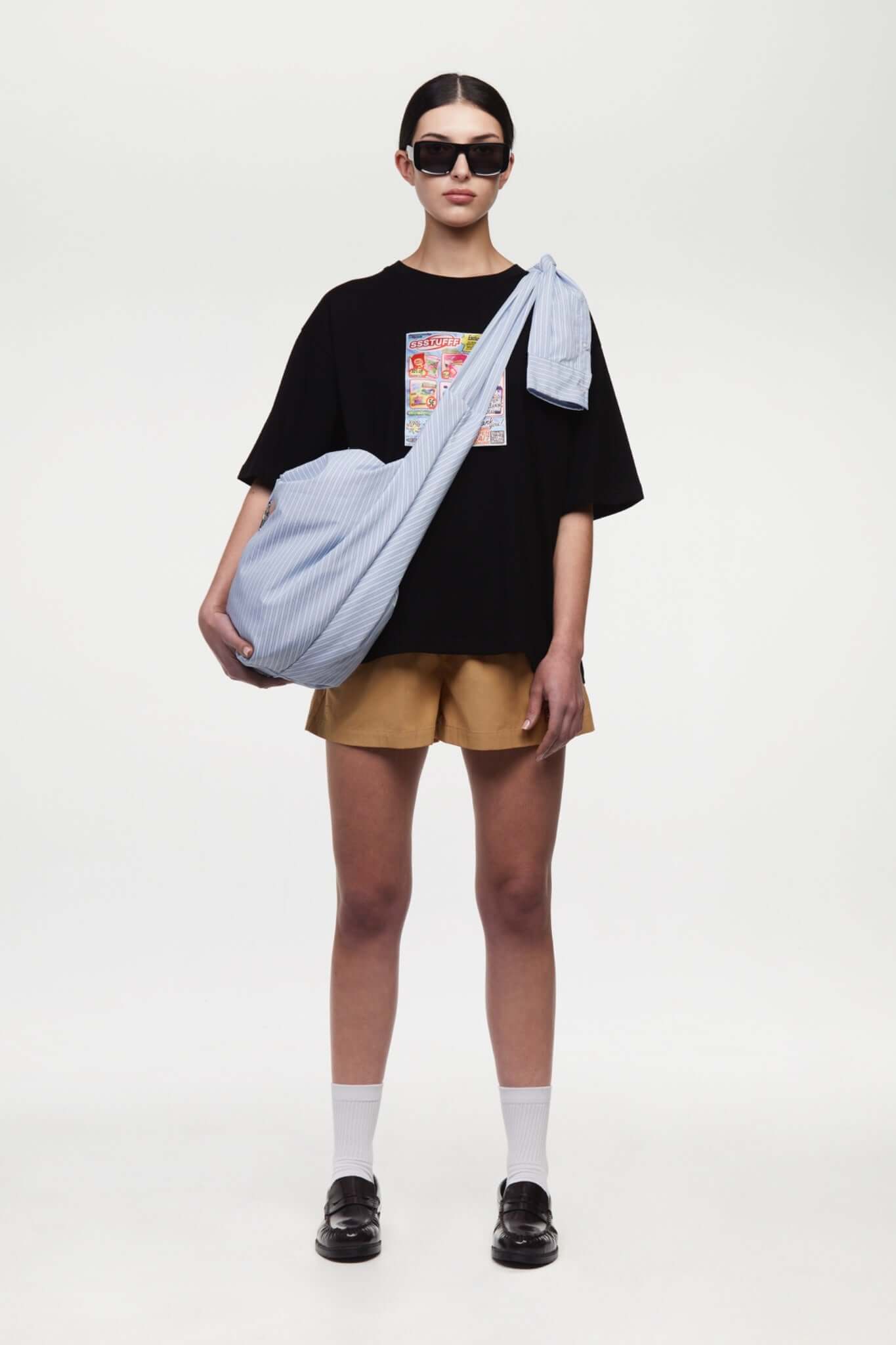 Beige boxer shorts with a red embroidery logo 
