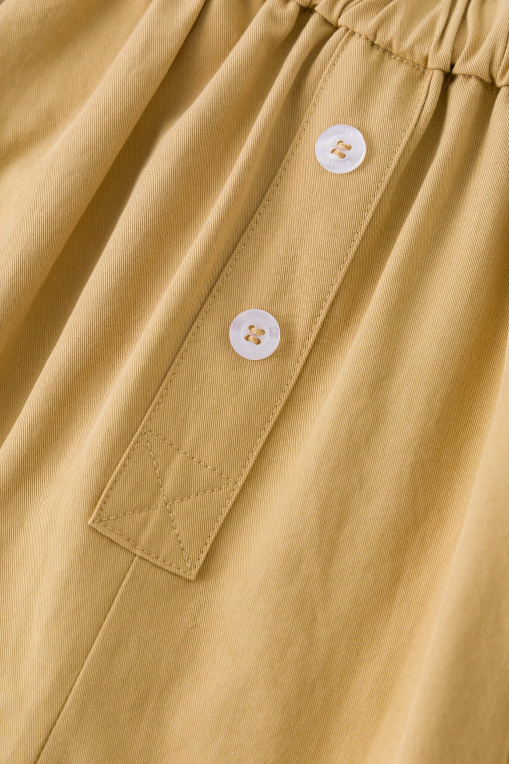 Beige boxer shorts with a red embroidery logo 