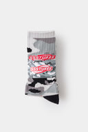 Camouflage-patterned black and grey sock with a brand logo embroidery 
