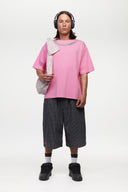 Black striped bermuda shorts with a logo embroidered
