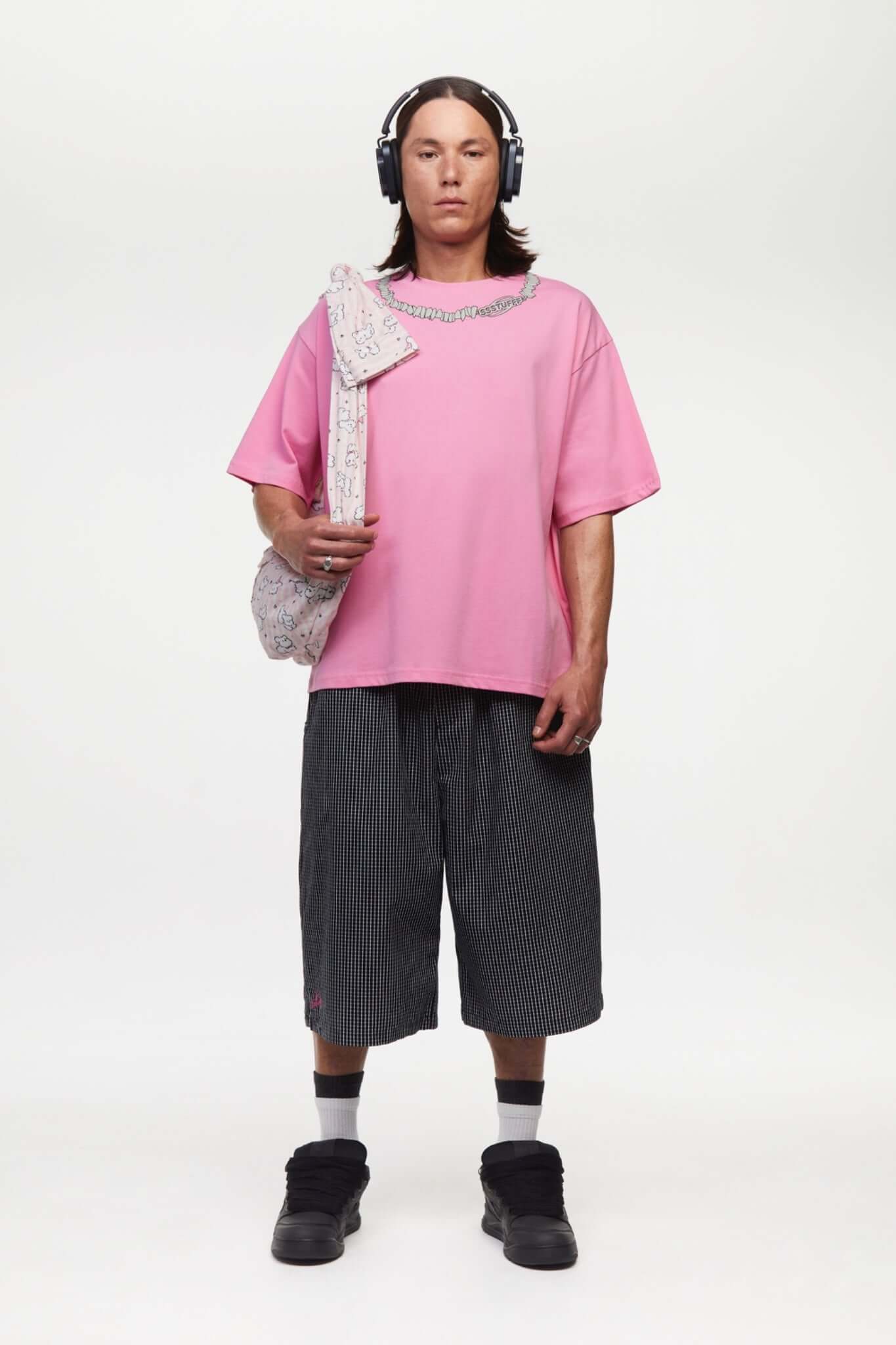 Black striped bermuda shorts with a logo embroidered
