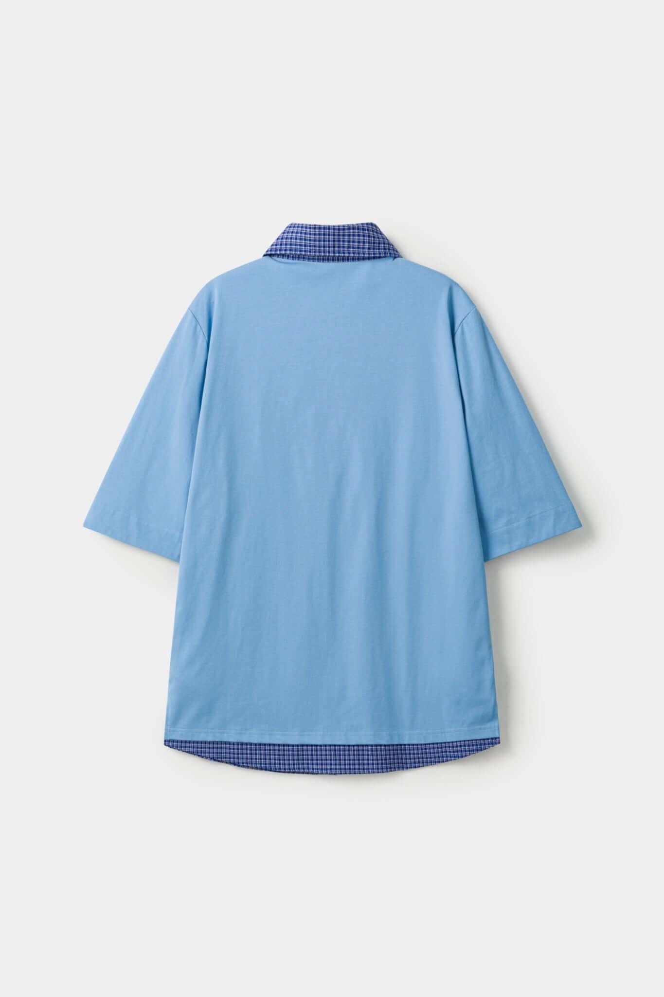 Blue polo shirt with checkered collar and sleeves
